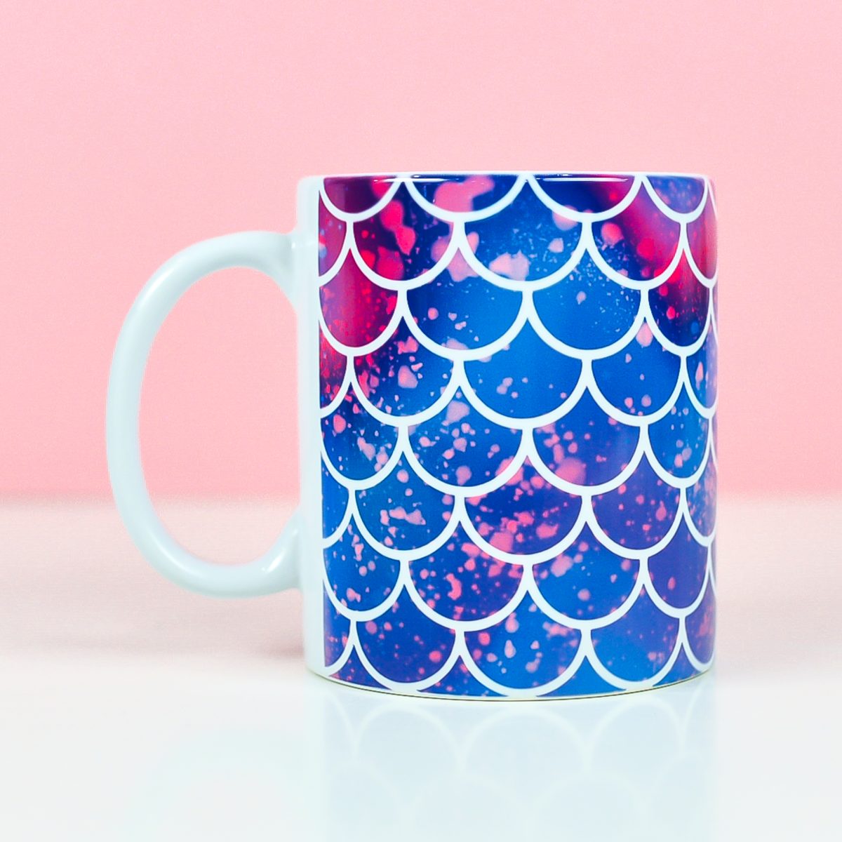 Mermaid mug on pink background made with mermaid mug wrap design