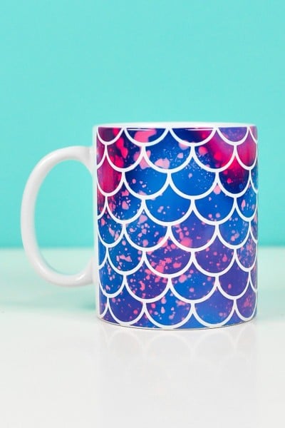 Mermaid mug on teal background made with mermaid mug wrap design