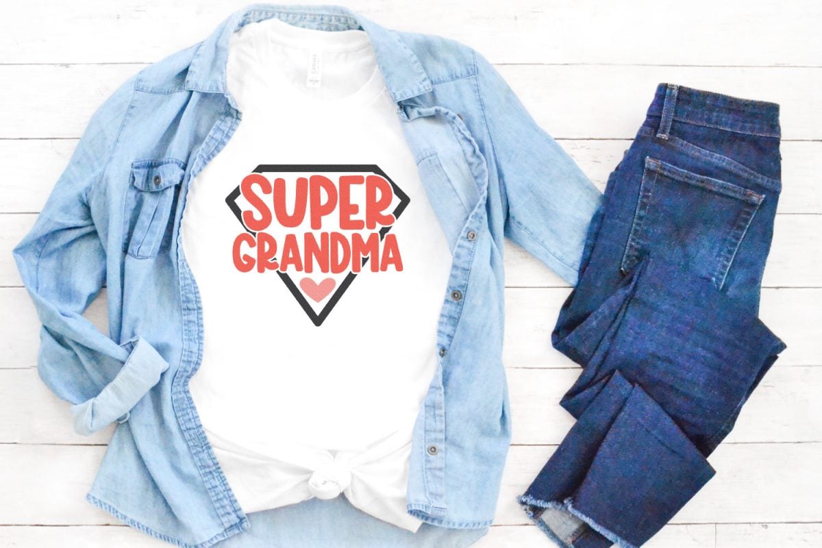 Super grandma SVG on white shirt with chambray button down and jeans