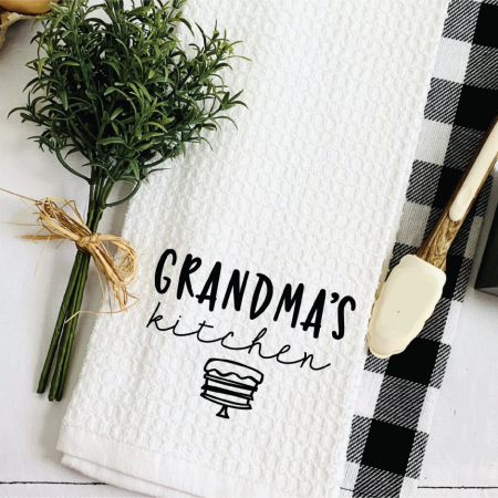 A white kitchen towel that says Grandma's Kitchen