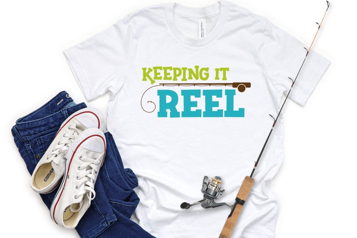 Keeping it Reel SVG on White Shirt with jeans and fishing rod