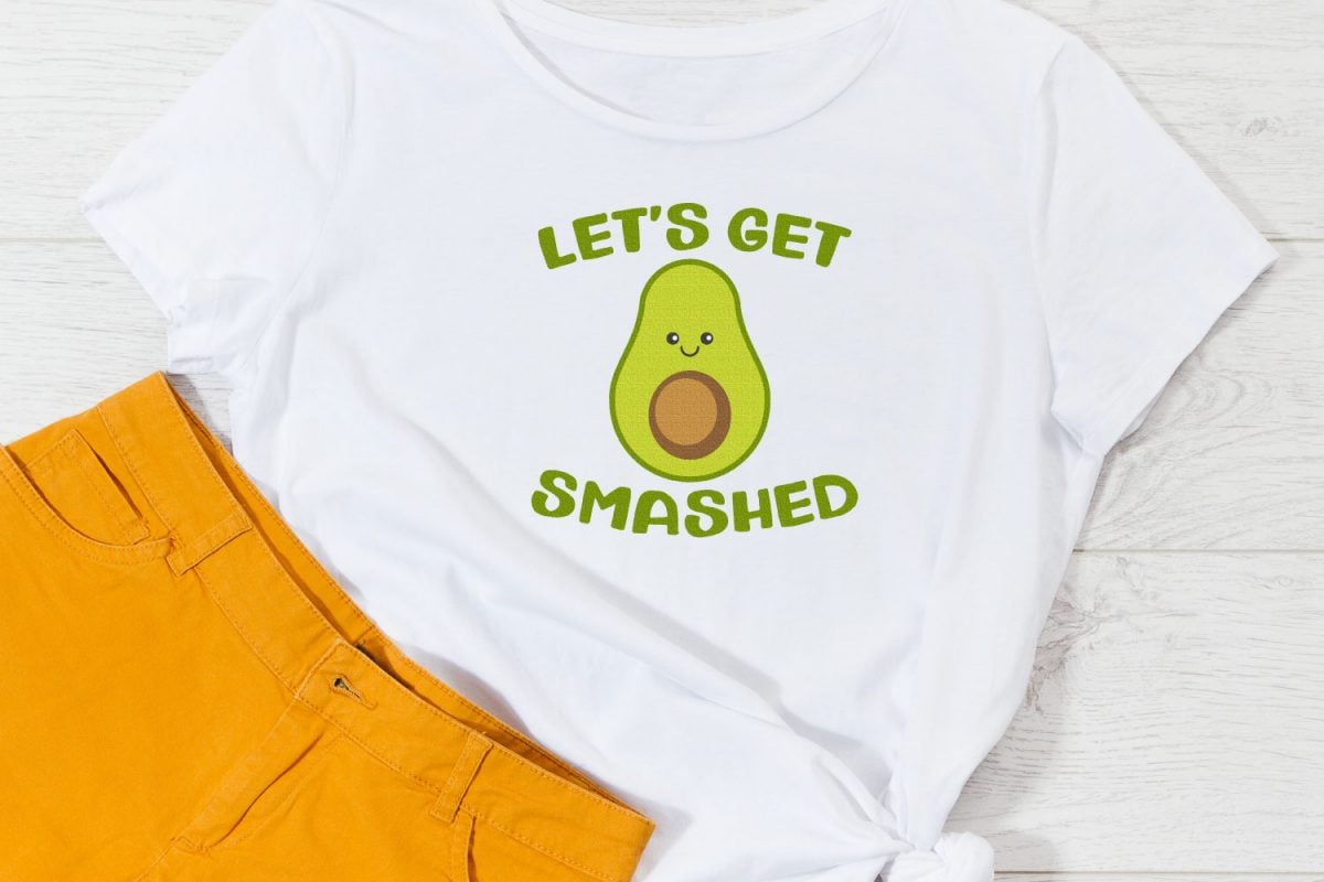 Let's Get Smashed SVG on white shirt with yellow shorts.