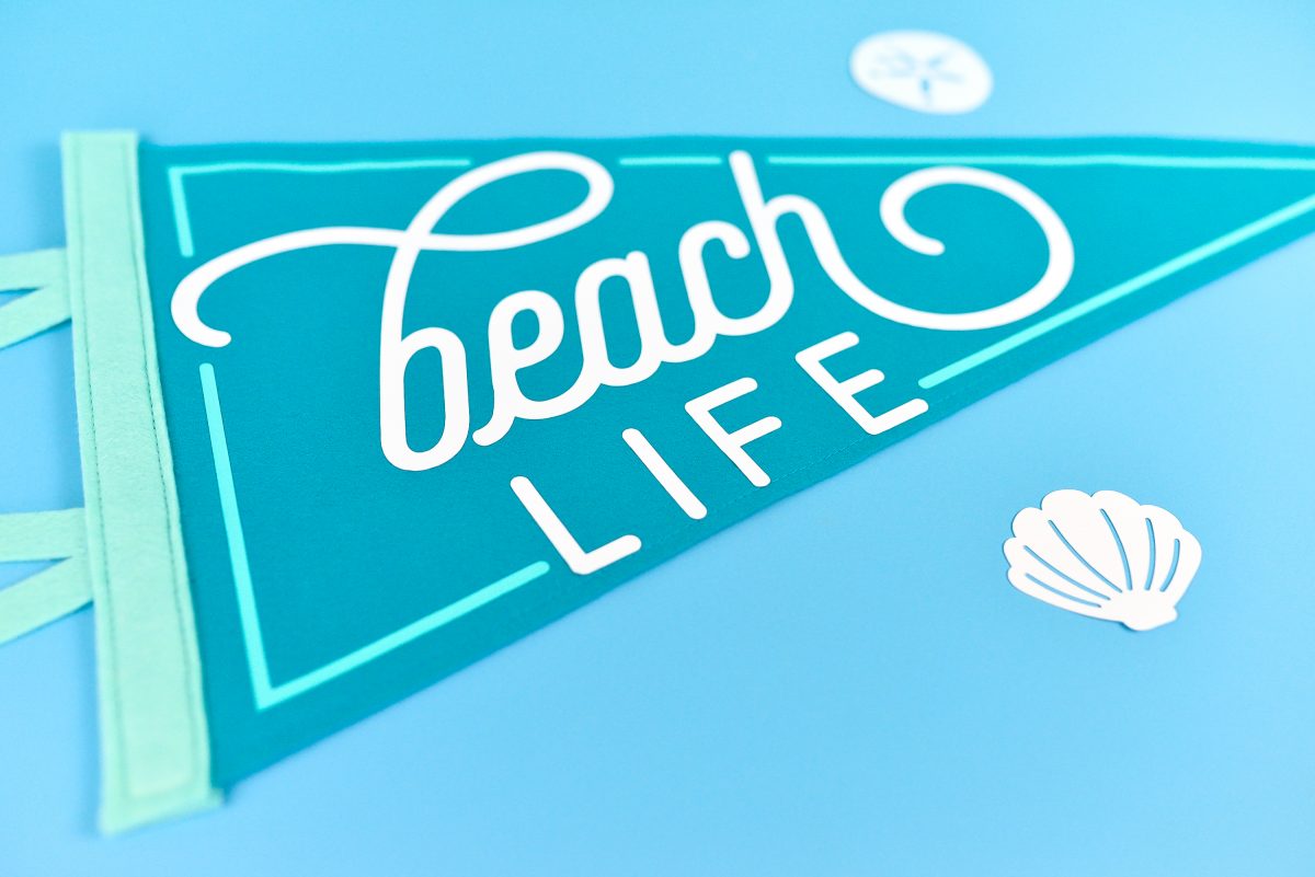 Angle vies Beach Life Pennant on blue background