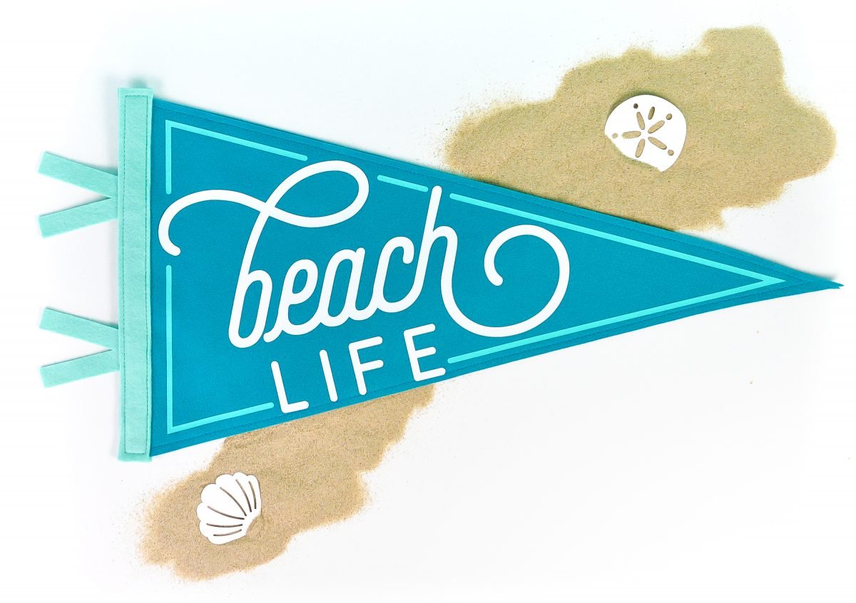 Beach Life Pennant on white background with sand