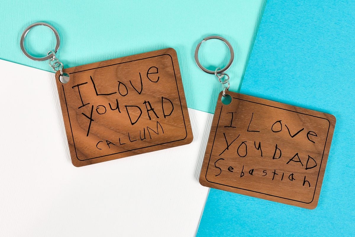 Finished keychains with child's handwriting made on a Glowforge