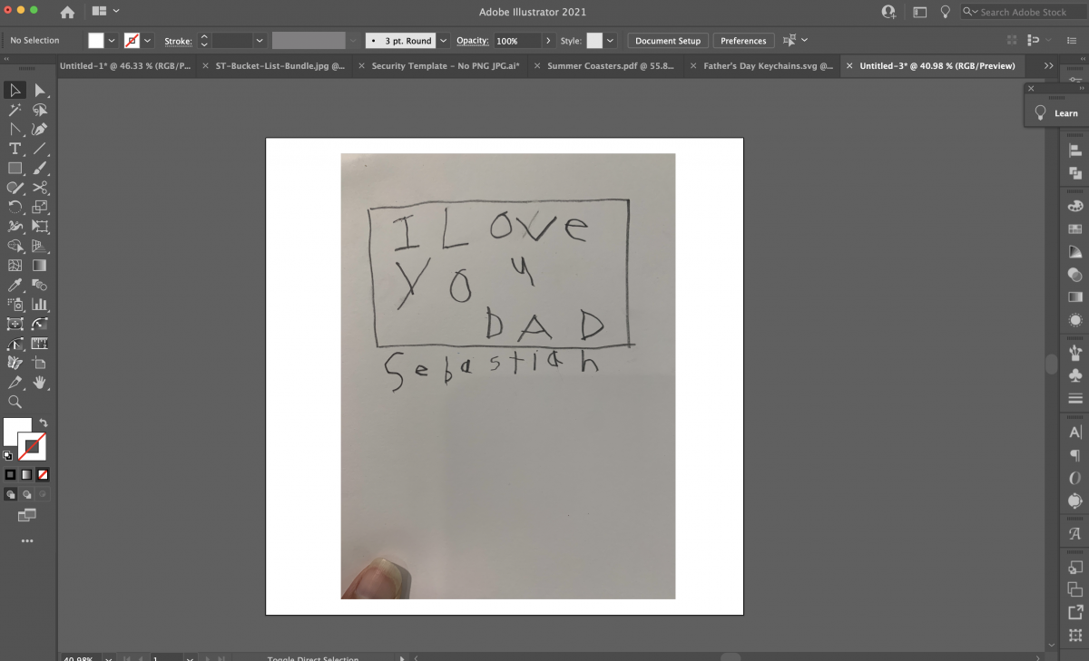 Illustrator: "I love you dad" photograph on art board.