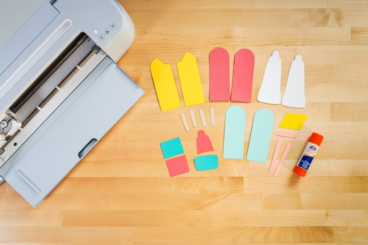 Popsicle Pieces cut from cardstock on table