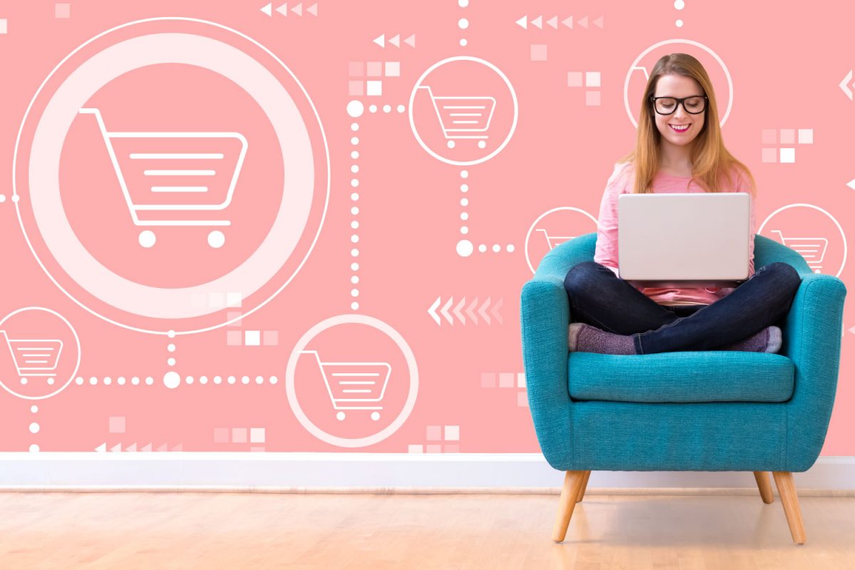 Stock photo of white woman with computer doing online shopping.