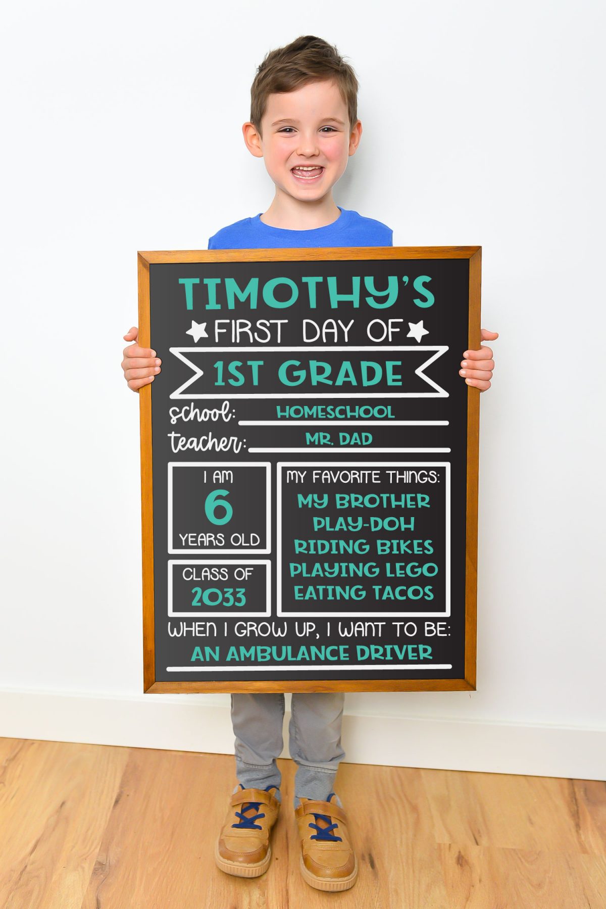 boy at blank chalkboard