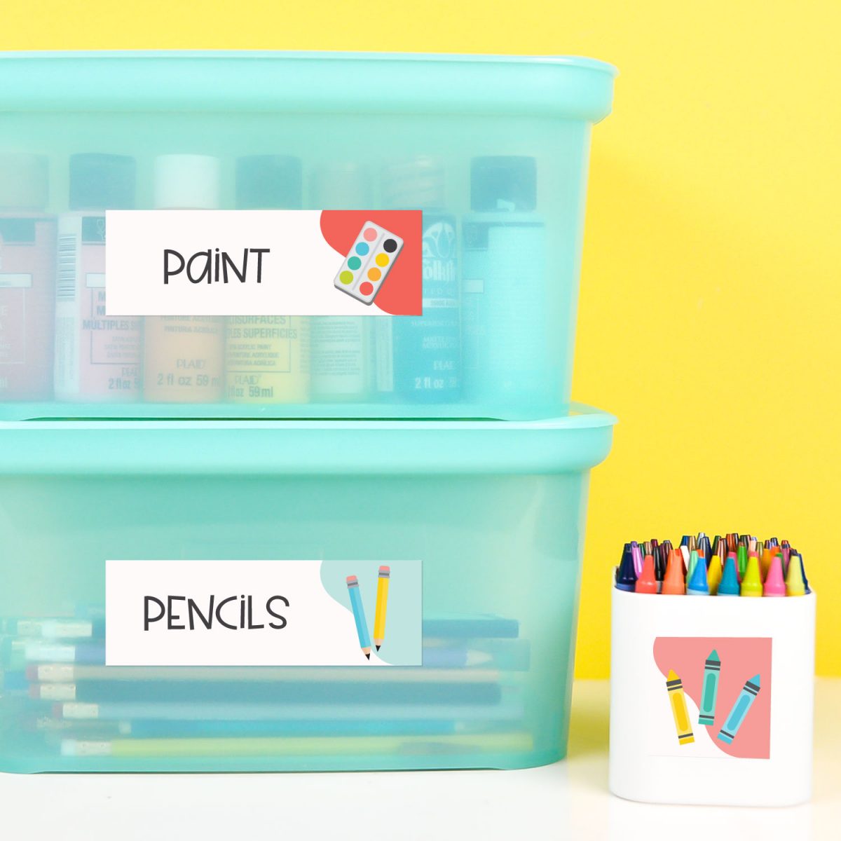 School supplies in boxes with classroom labels.