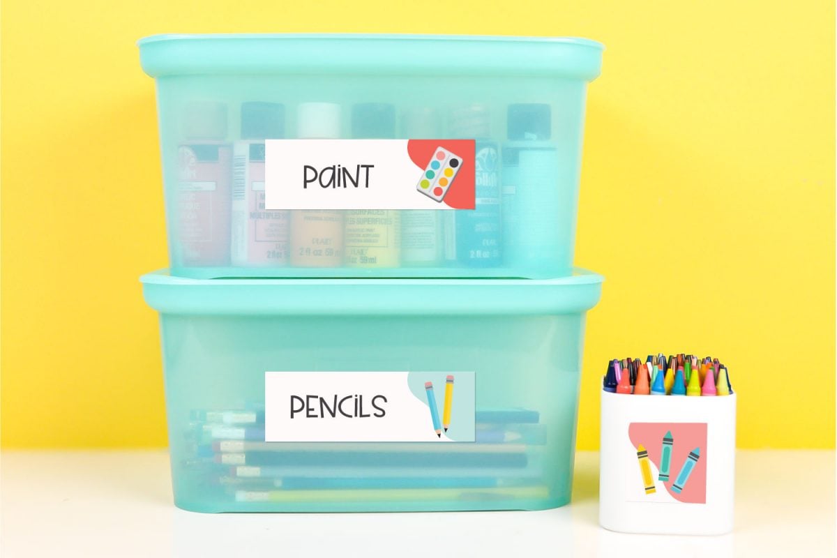 School supplies in boxes with classroom labels.
