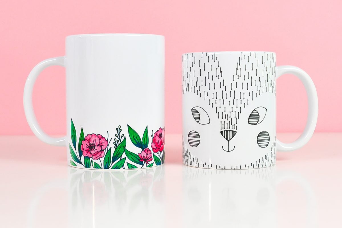 Final mugs using pens on pink background