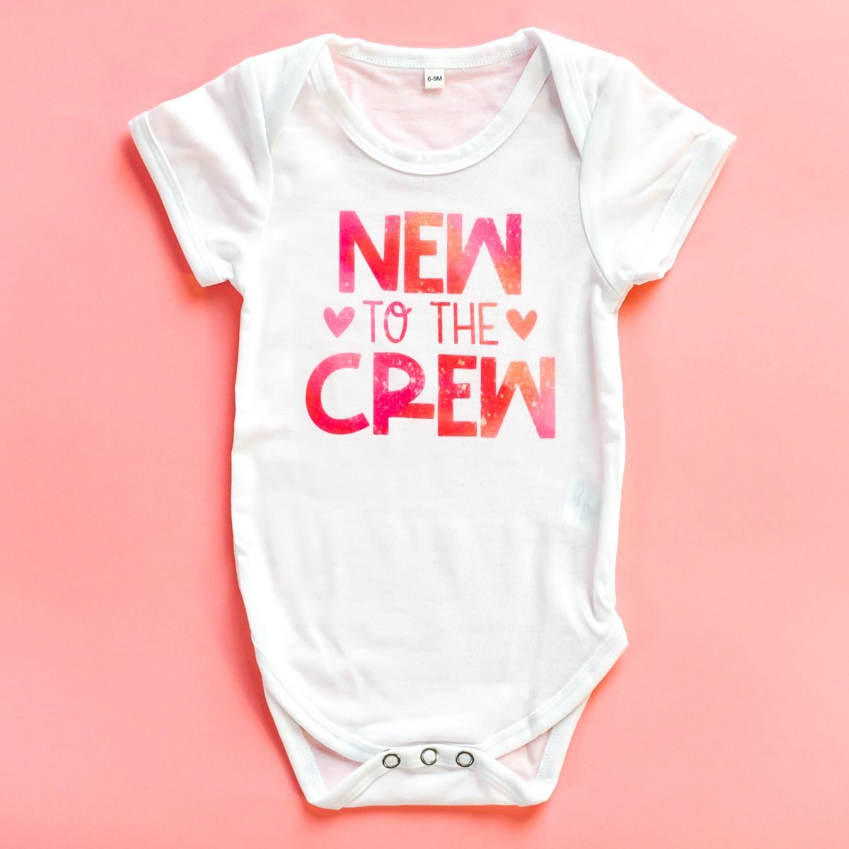 "New to the Crew" onesie using Infusible Ink.