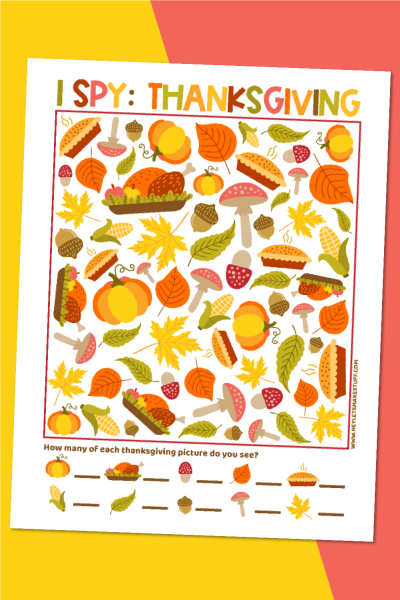 Thanksgiving I-Spy game on yellow and pink background with fake acorns.