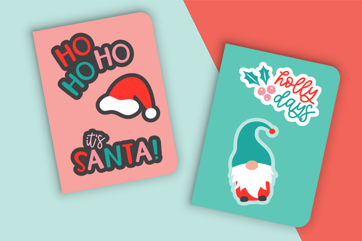 Christmas stickers on teal and pink notebooks