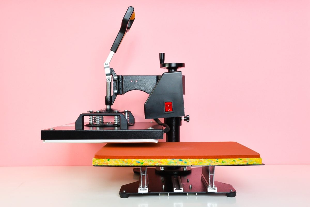 Open 5-in-1 Heat Press on pink background