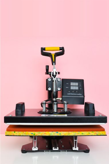 5-in-1 Heat Press on pink background