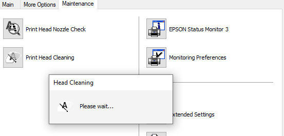 Screenshot displaying message that the printer is cleaning the heads