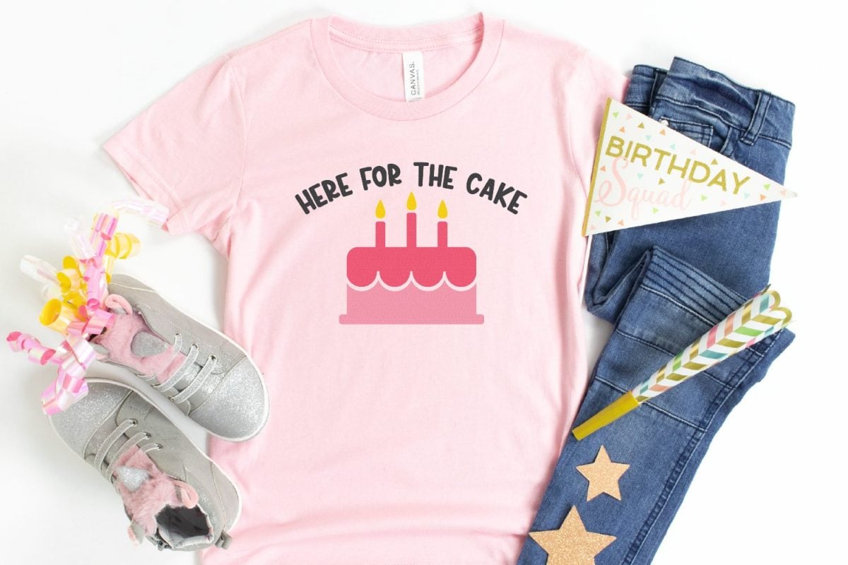 Here for the Cake SVG on pink shirt with birthday flag and stars