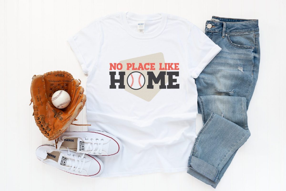 White t-shirt with "no place like home" SVG and baseball mitt and ball.