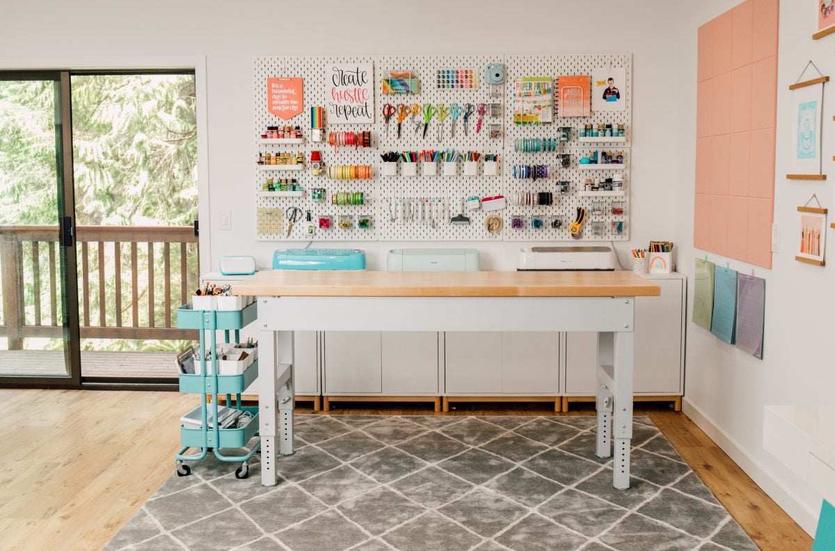 Craft room tour: View of entire filming area with pegboard and work bench