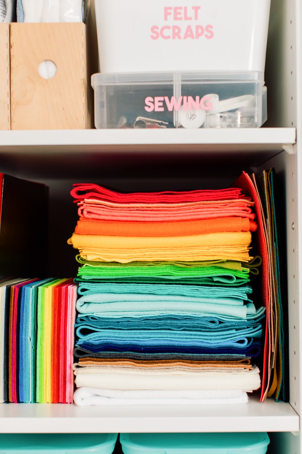 Craft room tour: Pax cabinet with a pile of rainbow felt.
