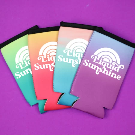 Four colorful coozies with the sun on them and the words Liquid Sunshine