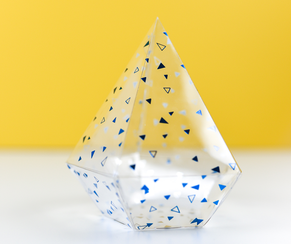 Foil acetate triangle box with yellow background