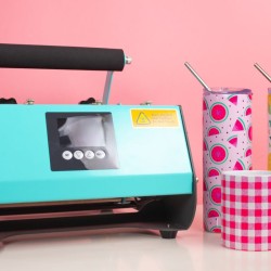 PYD Life Tumbler Press on table with tumblers and mugs and pink background