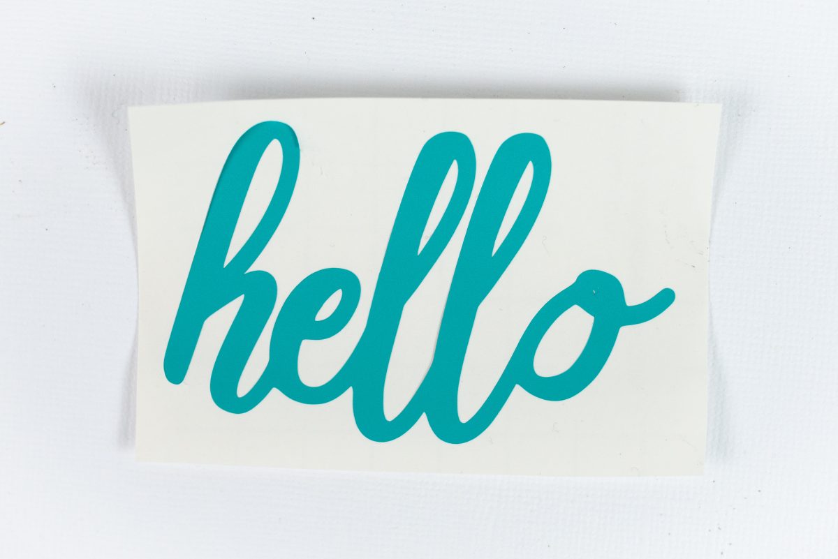 Hello cut from teal vinyl.