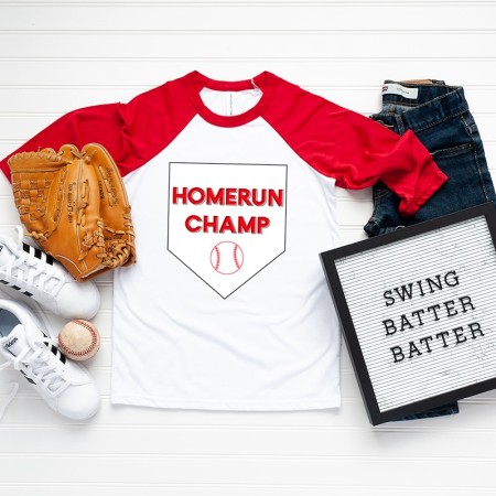Red and white baseball shirt with Hometown Champ design on it