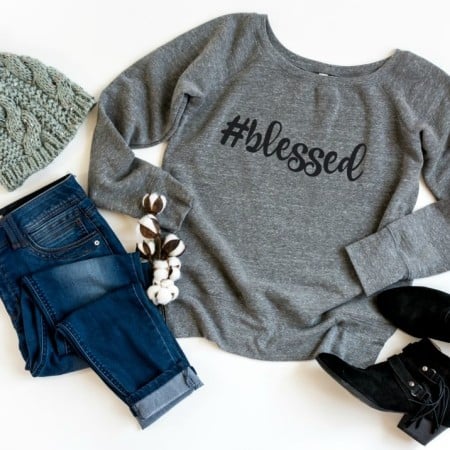Gray sweatshirt with the word #blessed on it