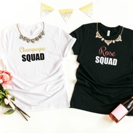 White t-shirt with the words CHAMPAGNE SQUAD and a black t-shirt with the words ROSÉ SQUAD