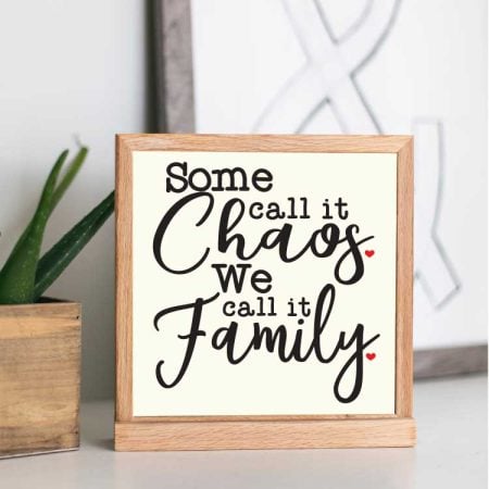 Framed sign that says Some Call It Chaos We Call it Family