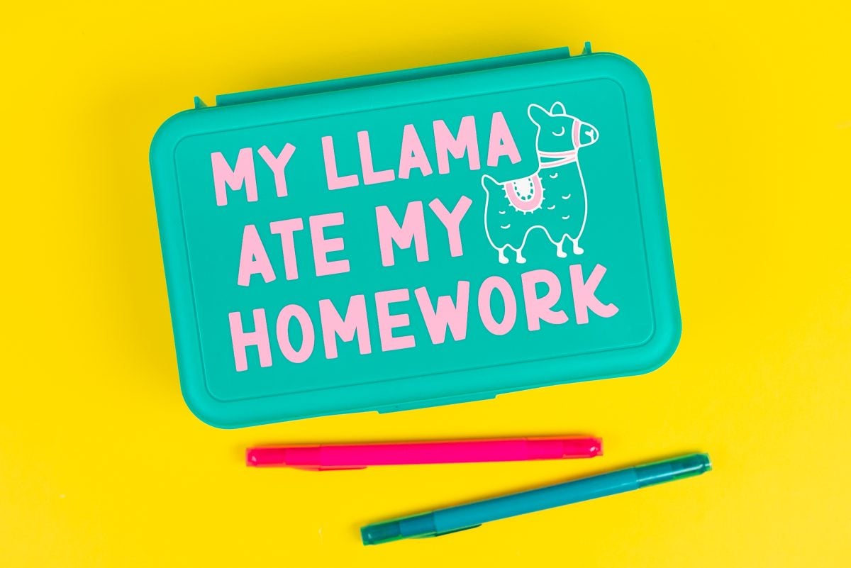 Finished "My Llama Ate My Homework" pencil box on yellow background