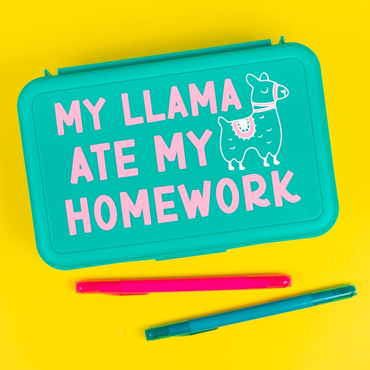 Finished "My Llama Ate My Homework" pencil box on yellow background
