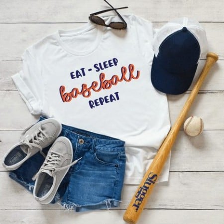 White t-shirt with the saying Eat Sleep Baseball Repeat