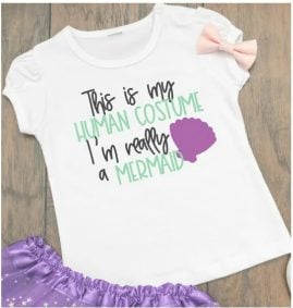 White t-shirt with a mermaid tail on it and the words This is my Human Costume I'm Really a Mermaid