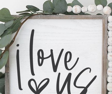 Farmhouse style sign that says I Love Us