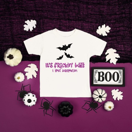 White t-shirt with bats on it with the saying It's Frickin' Bats - I Love Halloween