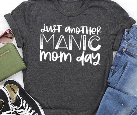 Dark gray t-shirt with the saying Just Another Manic Mom Day
