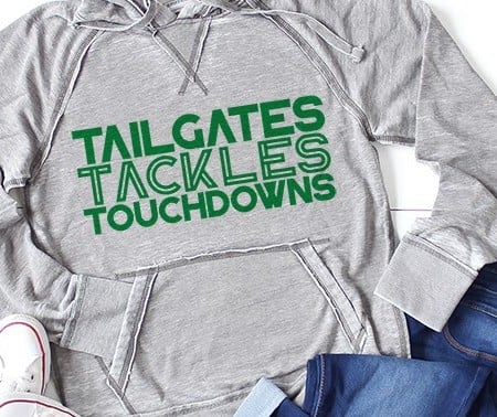 Gray hooded sweathsirt with the words Tailgates, Tackles, and Touchdown on it