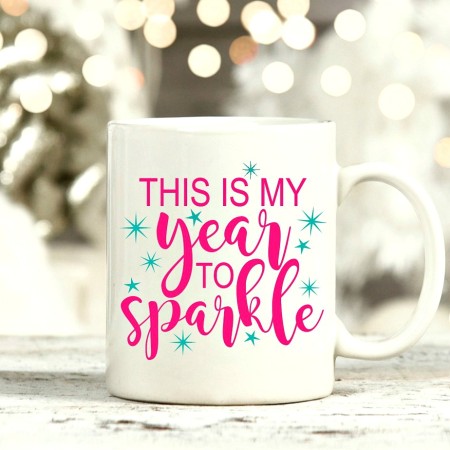 White coffee mug that says This is my year to sparkle