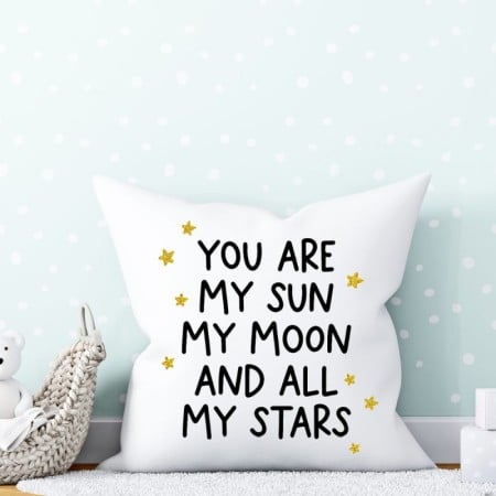White pillow with the saying You are My Sun My Moon and all My Stars on it