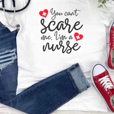 White t-shirt that says You Can't Scare Me I'm a Nurse