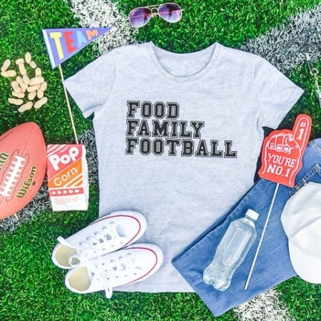 Gray t-shirt that says Food Family Football on it