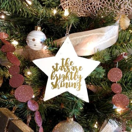 White start shaped Christmas ornament that says The Stars are Brightly Shining