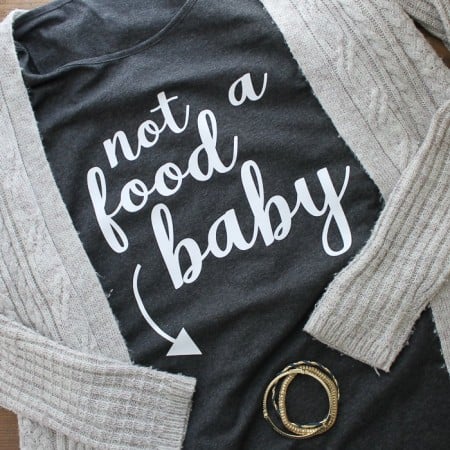 Dark gray maternity t-shirt with the words Not a Food Baby on it.