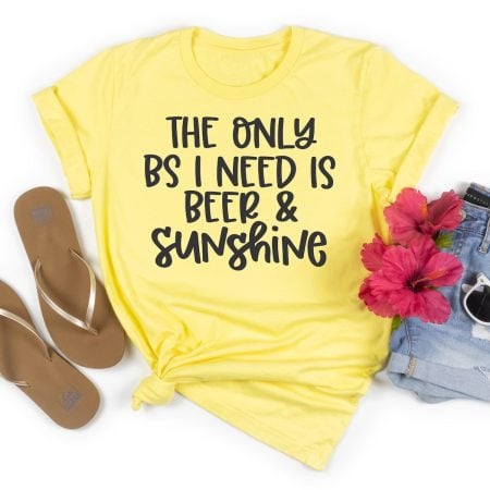 Bright yellow t-shirt with the saying The Only BS I need is Beer & Sunshine