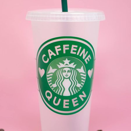 A cup with Caffeine Queen Starbucks emblem on it